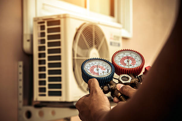 Professional Ac Installation technician working in Guilford, IN